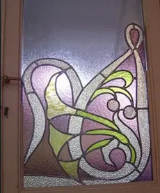 Restauration de deux vitraux de portes type art nouveau pour privé