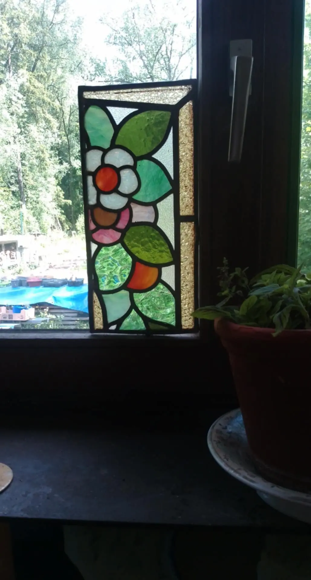 Restauration d'un petit vitrail art nouveau pour un particulier